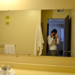 framing a bathroom mirror with pallets
