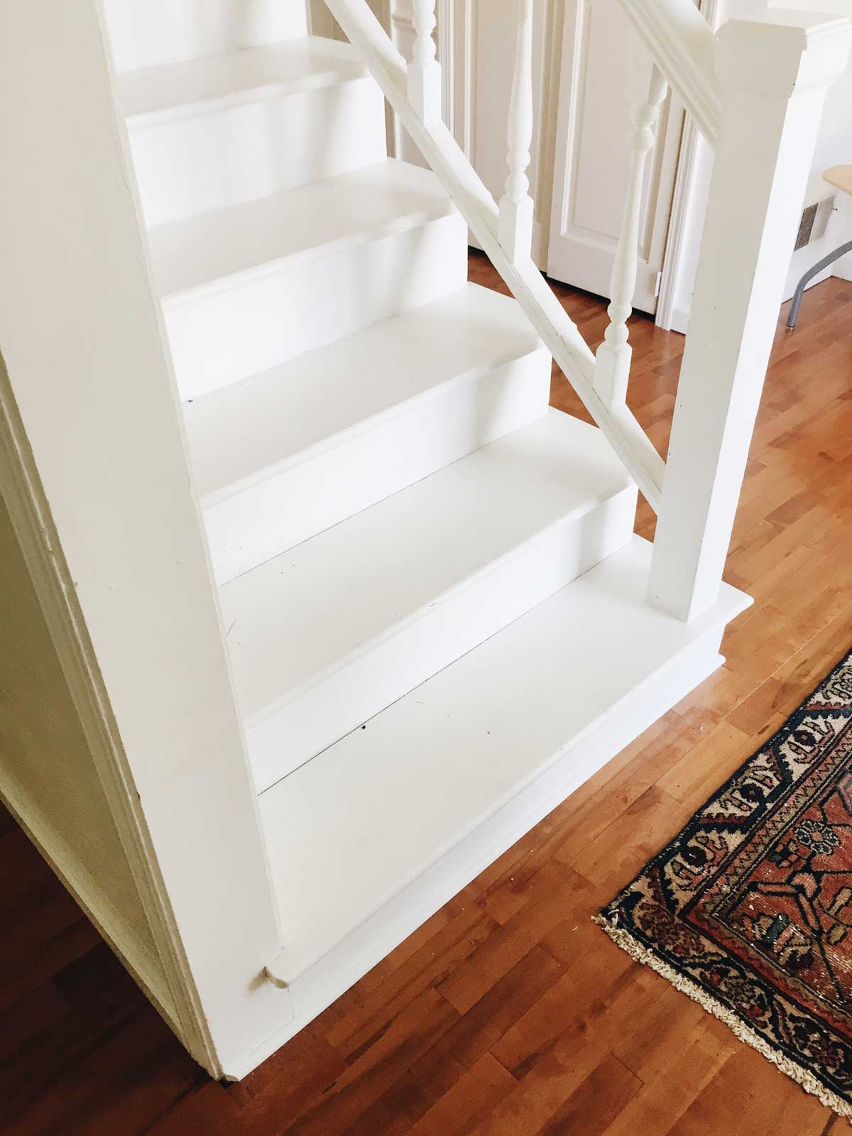 Rachel Schultz PAINTING A STAIRCASE WHITE